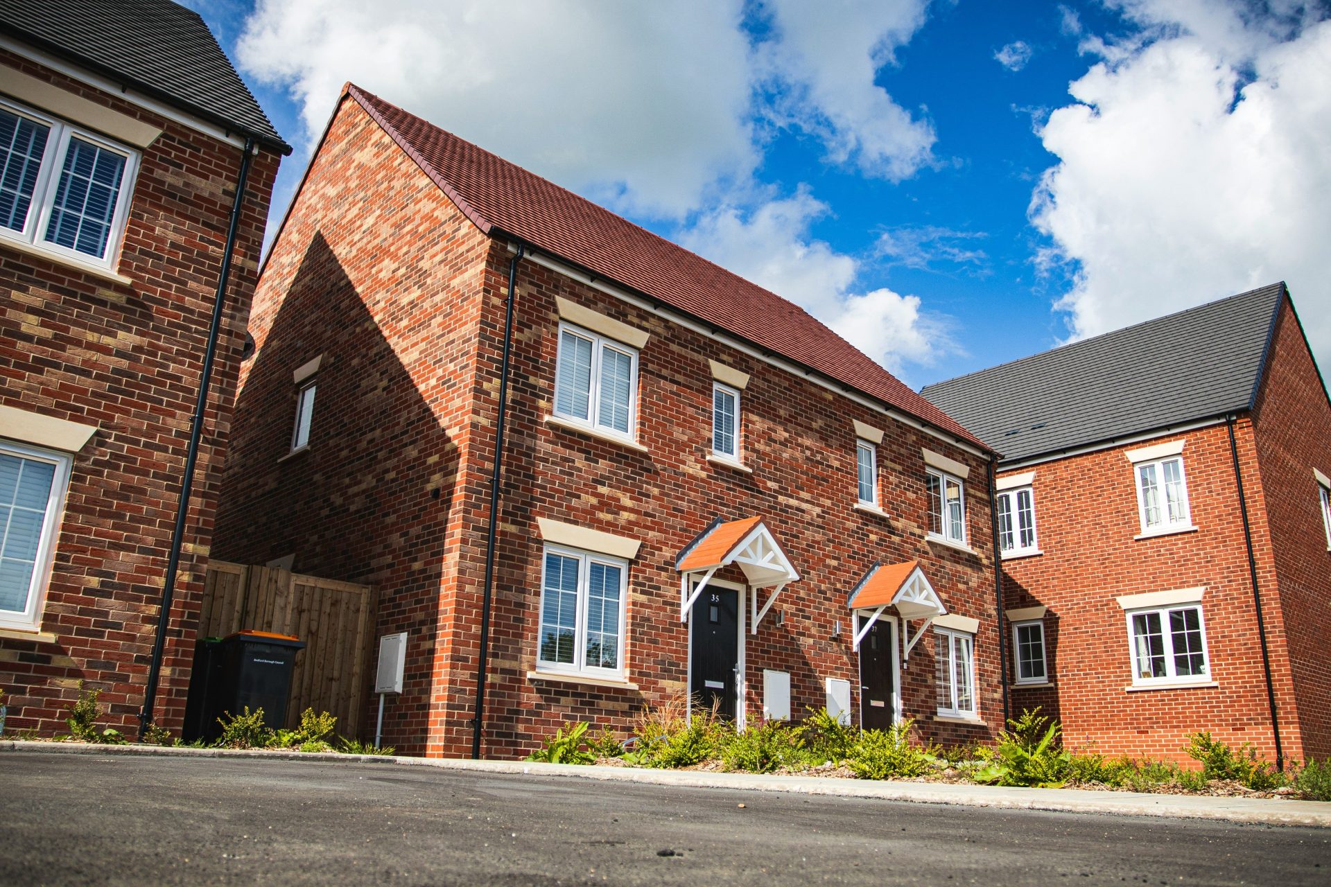 brown brick building under blue sky during daytime